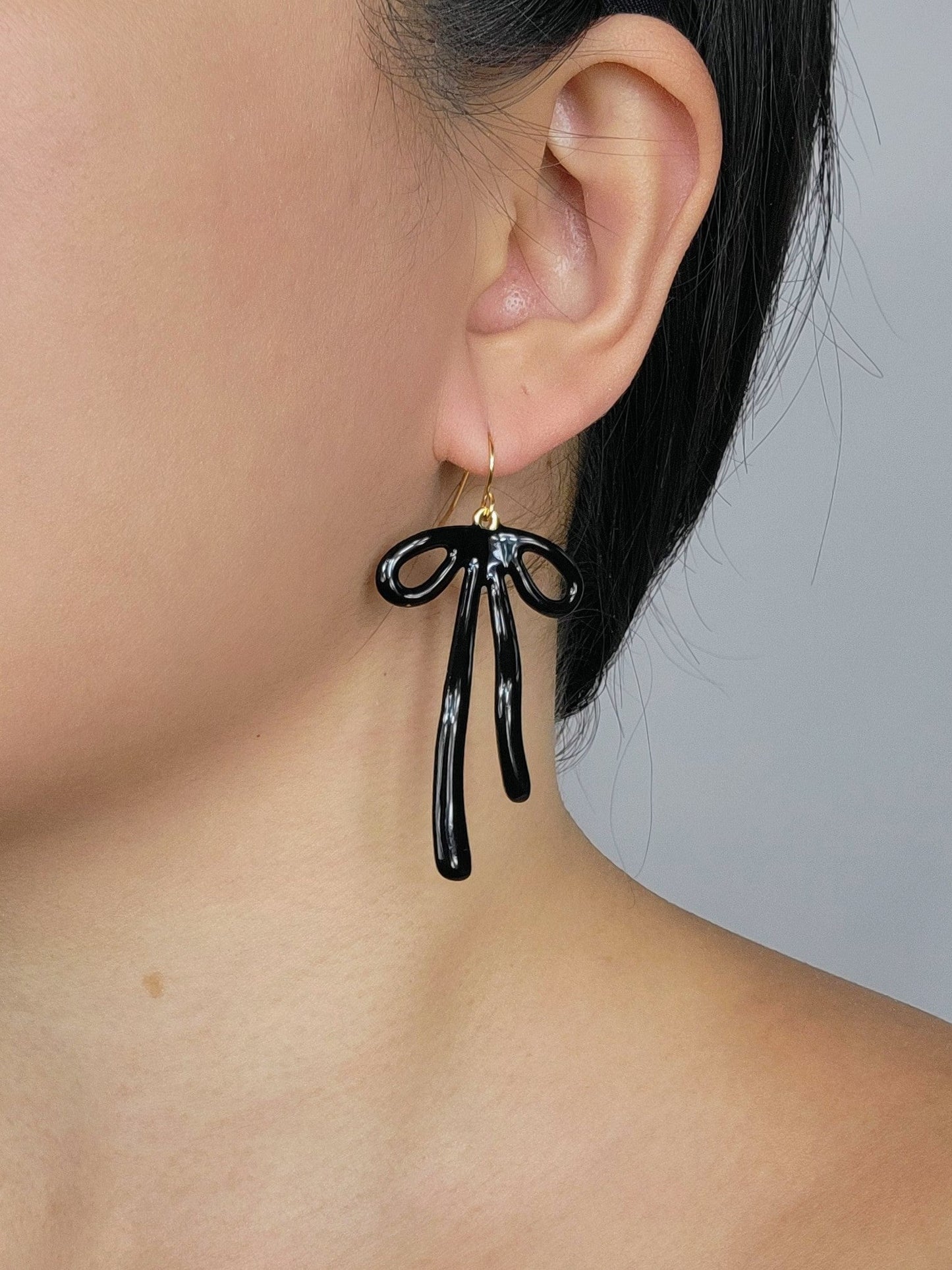 BAD TO THE BOW in Black